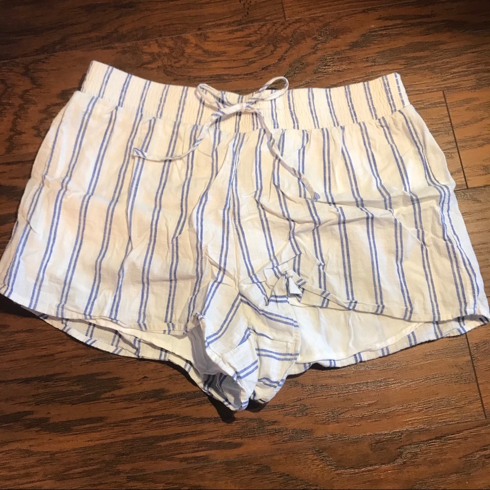 White shorts with blue stripes